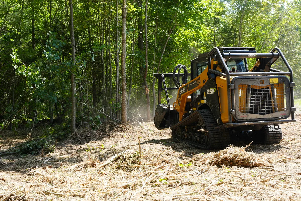 Clear Path mulcher working the wooded perimeter of a Middle Tennessee land-clearing project near Cookeville