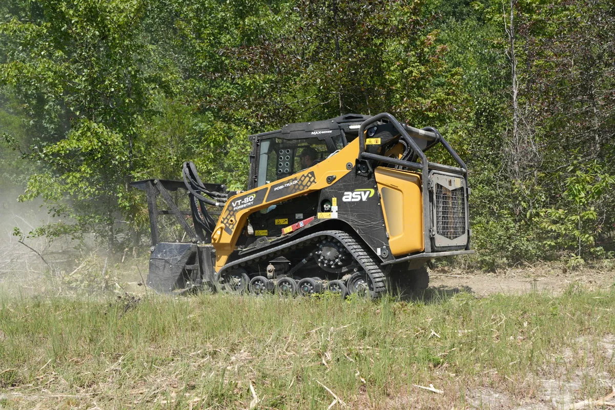 Clear Path mulcher actively clearing overgrown brush on a McMinnville-area Tennessee property